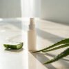 aloe-zinc-sunscreen Herbal Aloe sunscreen bottle on a smooth, light-colored surface