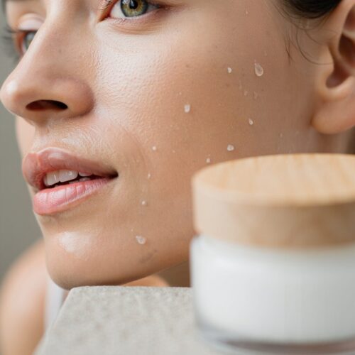hydrated glowing skin with a few tiny, natural water droplets